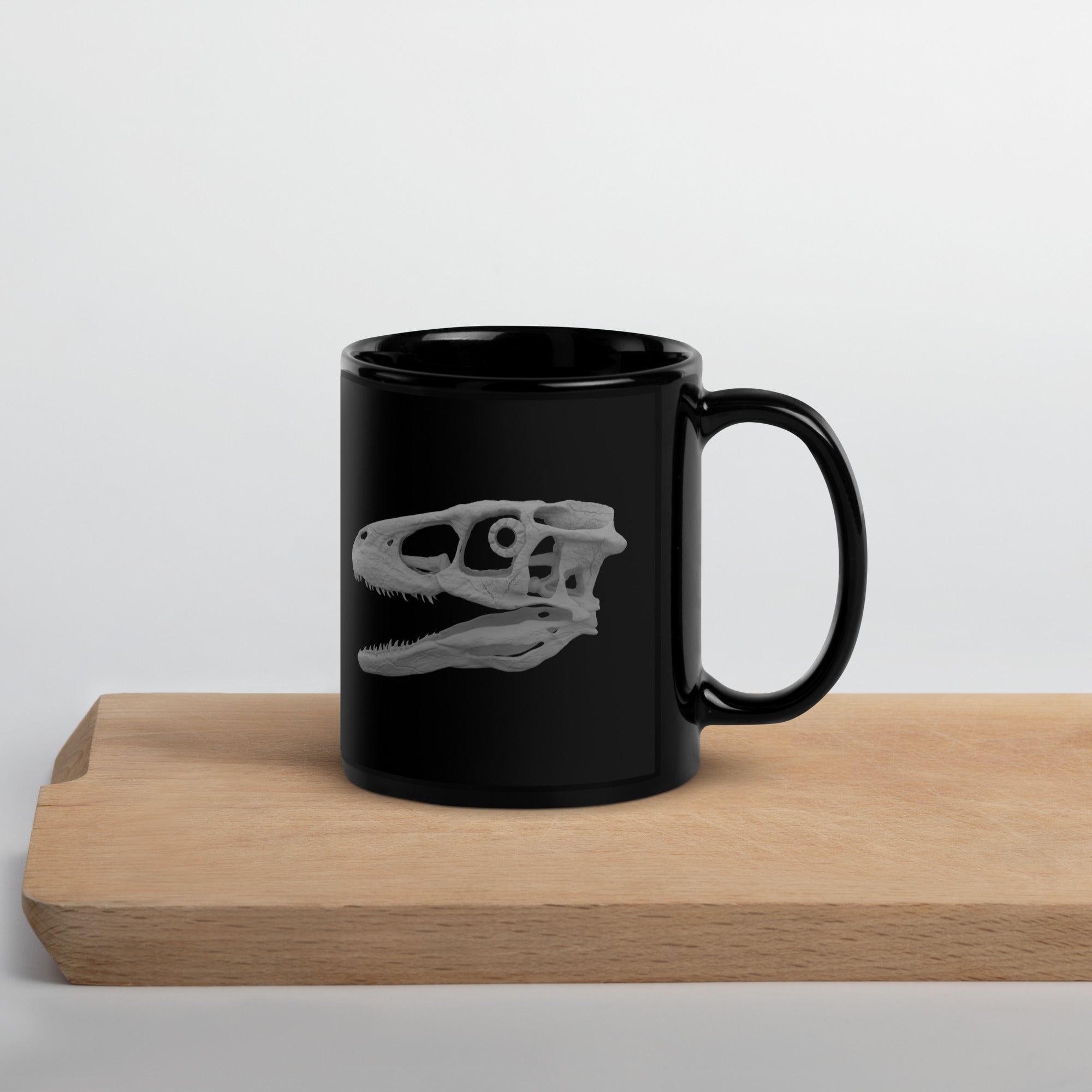 Taza negra brillante cráneo Deinonychus