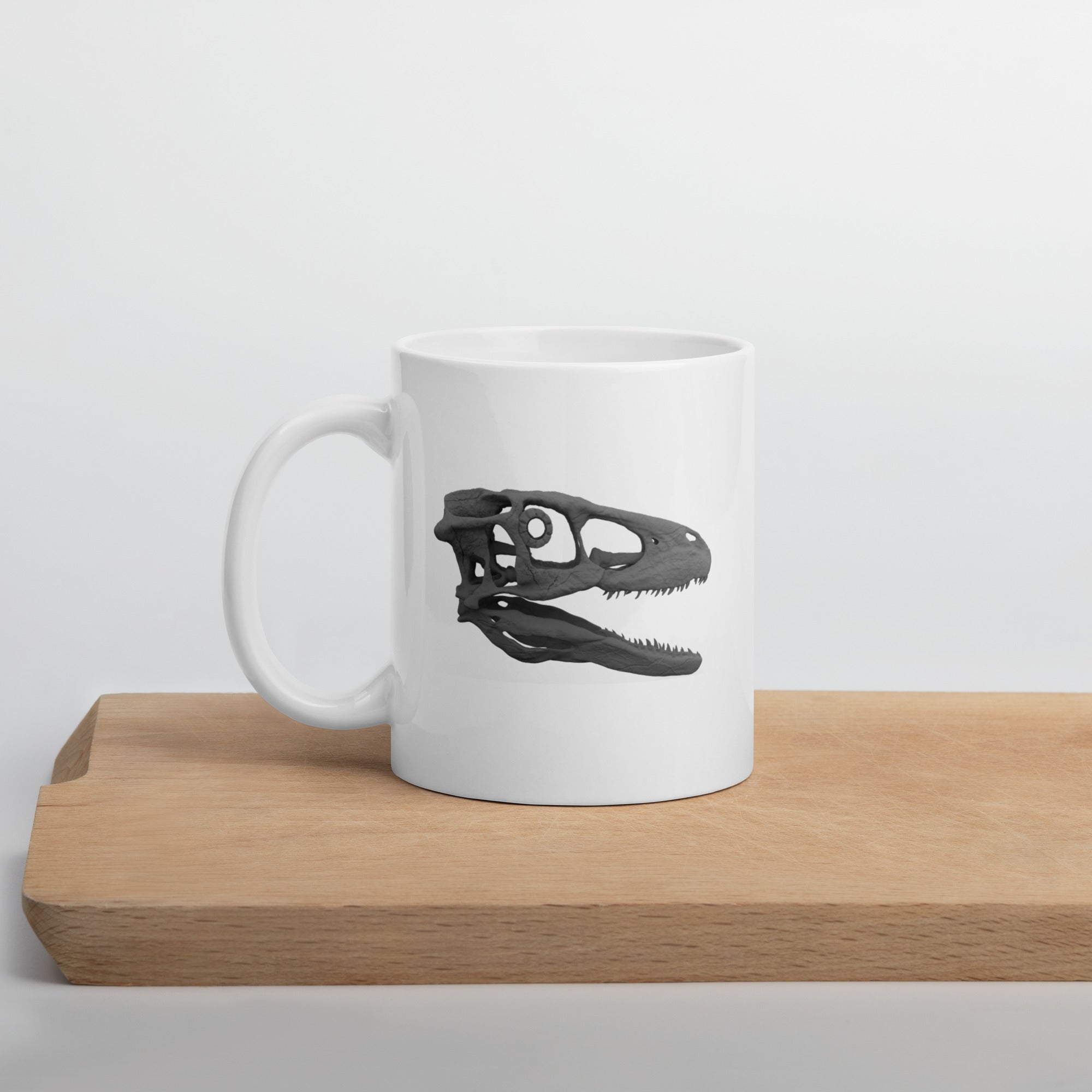 Taza blanca brillante cráneo Deinonychus